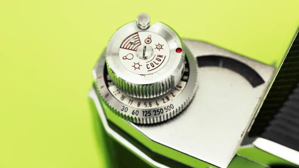 Close-up of a vape device with a dial for adjusting color and settings, highlighting the issue of  Vape tastes burnt.